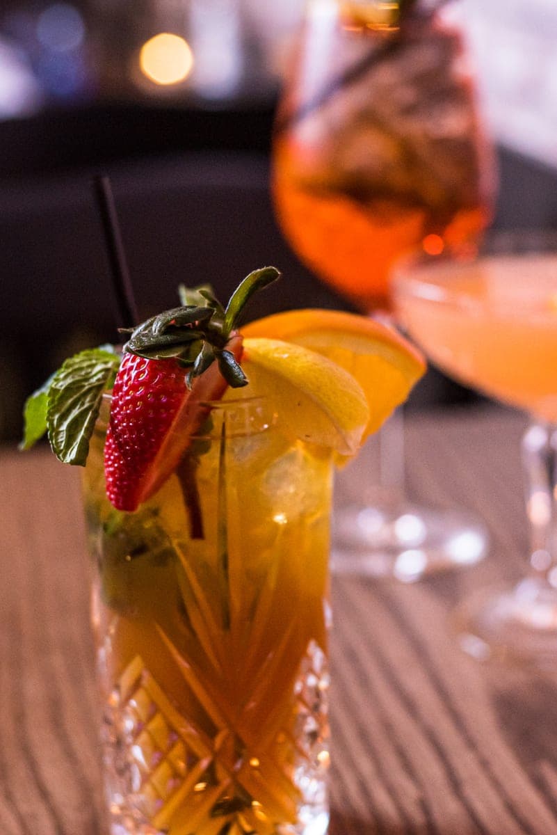 Craft cocktails and a strawberry cooler at The Crown Tavern bar in Glen Mills, PA