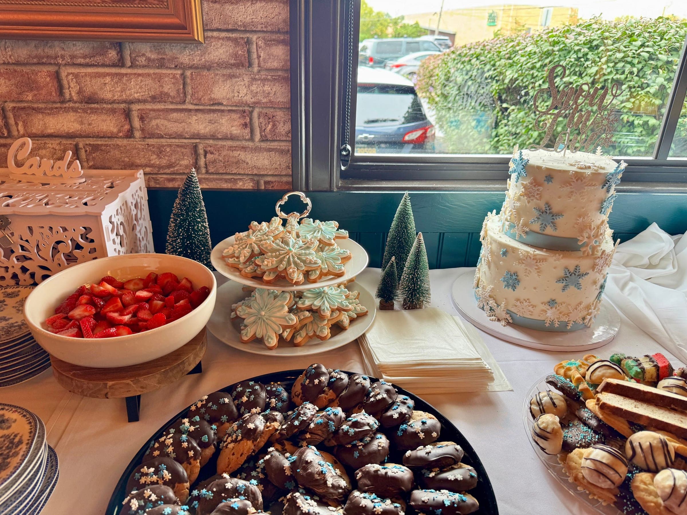 A bridal shower dessert table of cookies, pastries and a decorated cake at Crown Tavern in Glen Mills, PA