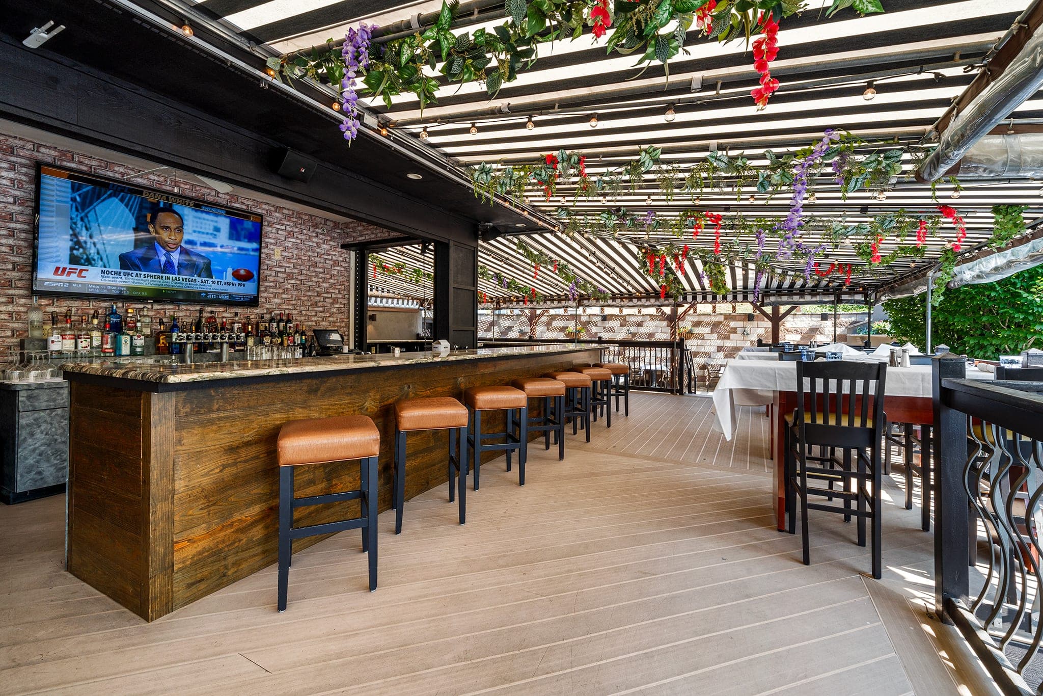 The Garden Bar with covered patio seating at Crown Tavern in Glen Mills, PA